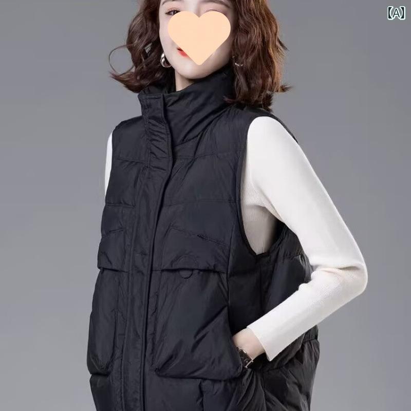 白 鴨の 羽毛の 馬 甲の 女性の 短い タイプの 新型の 秋冬の ゆったり して いる 百 合は 厚くて、 外は カンカンの 肩の 小さい 背の コートを 着て 潮が 満ちて います。