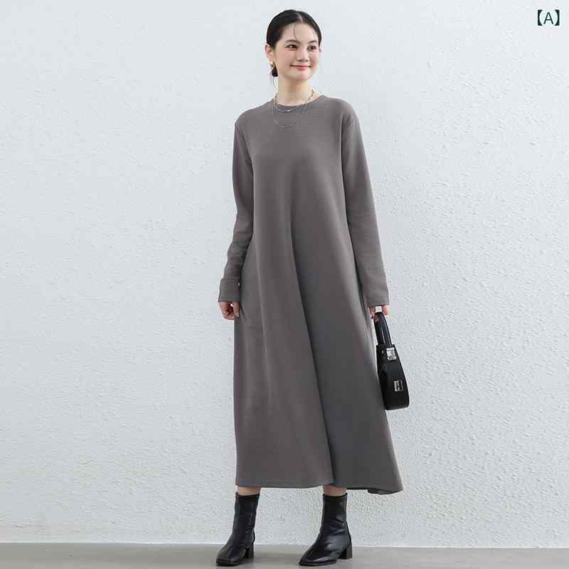 春と 秋の 新型 日系の 中 長の ワンピースの純 色の ゆったり した 長袖の ポケット 付きの 底の ワンピースは 大きいです。