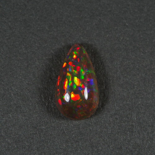 無処理 エチオピアブラックオパール1.99ct bf-3360 エチオピアオパールは白や淡いハニーカラーなど明るいボディーカラーのものが主流ですが、このルースは天然のままで赤みを帯びた黒褐色のボディーカラーを持つ珍しいものです。現在、市場での流通量は少いです。｜レアストーン専門店大阪ウエルダー