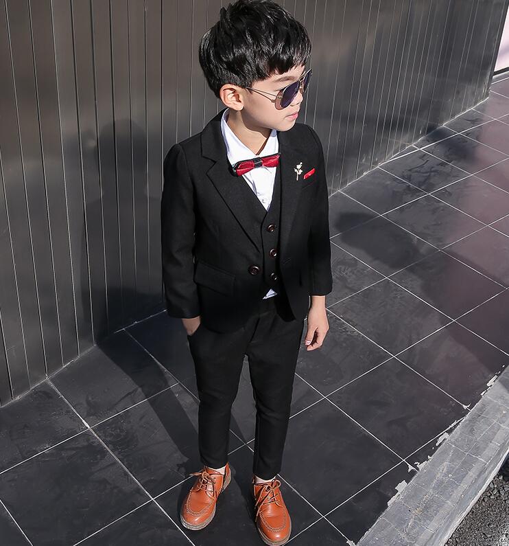 【送料無料】子供スーツ セットアップ キッズスーツ 男の子 スーツ ジュニア スーツ イギリス風 上下セット フォーマルスーツ スーツ 子供 入学/卒園/卒業式 子ども用スーツ 男の子スーツ 結婚式 七五三 誕生日 発表会 5点セット ジャケット+ベスト+パンツ+蝶結び+コサージュ