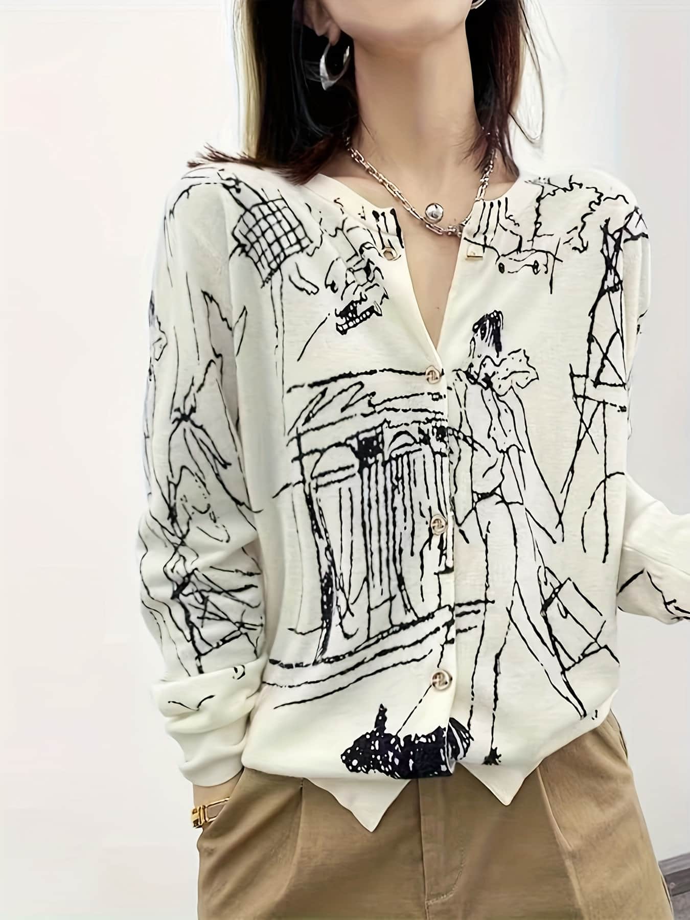 【全店通用25%OFFクーポン】【アートな雰囲気】 カーディガン レディース ニット トップス Vネック 総柄 イラスト 手書き風 プリント 長袖 羽織り 前開き モード系 体型カバー 着痩せ 細見え 30代 40代 50代 オフィス 通勤 OL 普|大森麗萱