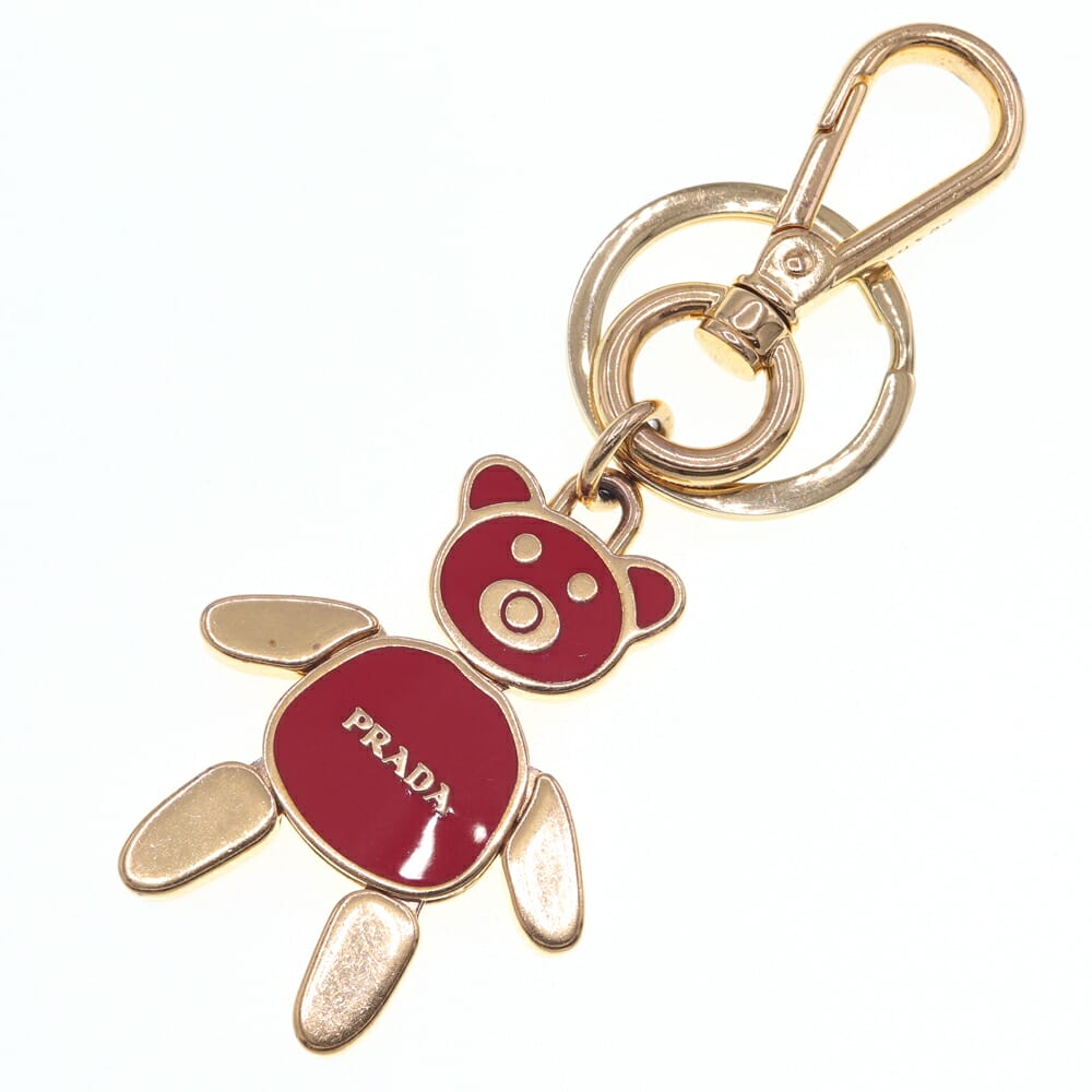 PRADA クマのキーホルダー ゴールド/レッド PRADA クマのキーホルダー ゴールド/レッド - メルカリ
