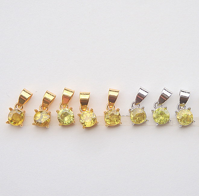 ポ*助様 【K18×スフェーン1.60ct】虹色の輝きペンダントトップ 84173.jpg?v=1692066933&width=1200