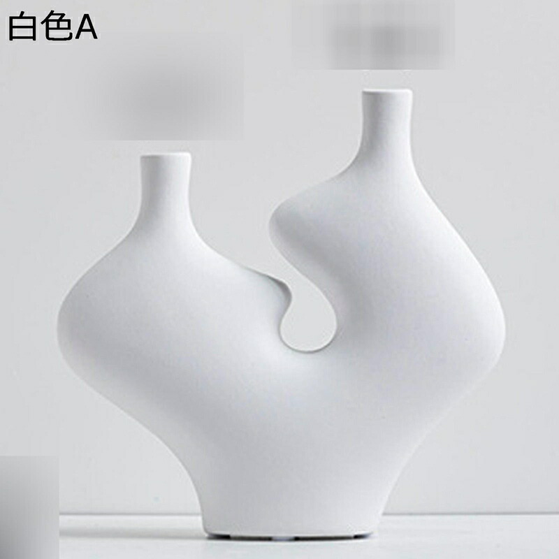 御花界面花器 瀬戸もの花器 一輪挿し ドライフラワ用花器 白 黒 面白可笑しい 目あたらしい 飾りつけ 不規則さ 変わり種 家飾りつけ個条 苑地かざり付ける 夫婦関係用差し上げ物 北欧曲線状の形表現スタイル 日系青写真 白いこと 黒いこと