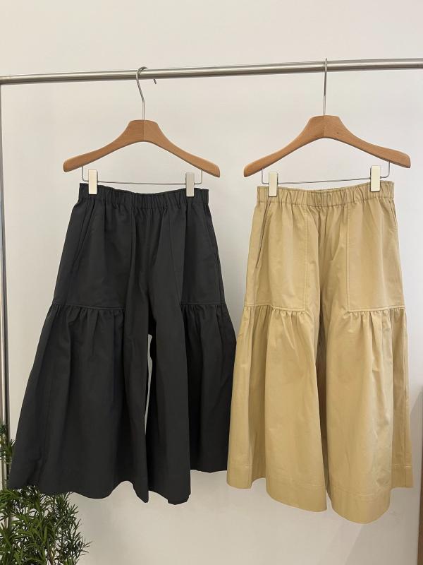 25  の ツイルの 揺るぎない 綿の 布の タックの ゆったりした 莟の スコートの ズボン