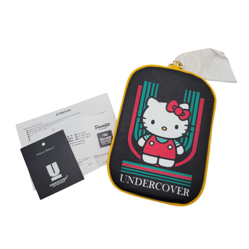 百貨店SALE 10%OFF~【中古美品】【レディース】 UNDERCOVER アンダー取りまかなう × SANRIO CHARACTERS サンリオキャラクターズ HELLO KITTY PVC POUCH UC2E8K01  日暈キティ 合切袋 208-260401-as-15-izu 色つや：黒いこと×黄色 生生世世Net店
