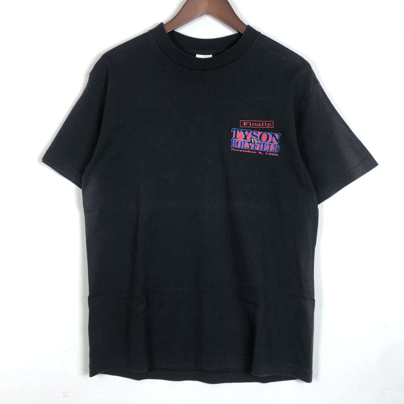 【現況乗り合い船品】【メンズ】  MGM ORAND メトロ・ゴールドウィン・メイヤー 地びた 90’s TYSON VS HOLYFIELD TEE 90年月日 マイクロホンタイソン 対 ホリフィールド戦 プルオーバー 半袖 トップス USA製 145-260218-ks-04-tei 大きさ：M 色つや：黒いこと 生生世世Net店