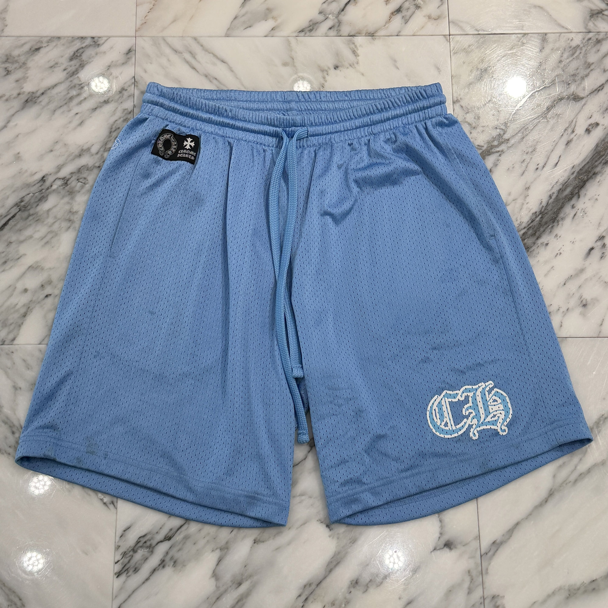 CHROME HEARTS Mesh Varsity Shorts Size L クロムハーツ メッシュヴァーシティーショーツ ショートパンツ ナイロンハーフパンツ ロゴパッチ CHプリント ライトブルー サイズL【260713】【中古-B】｜メメントスオンライン店