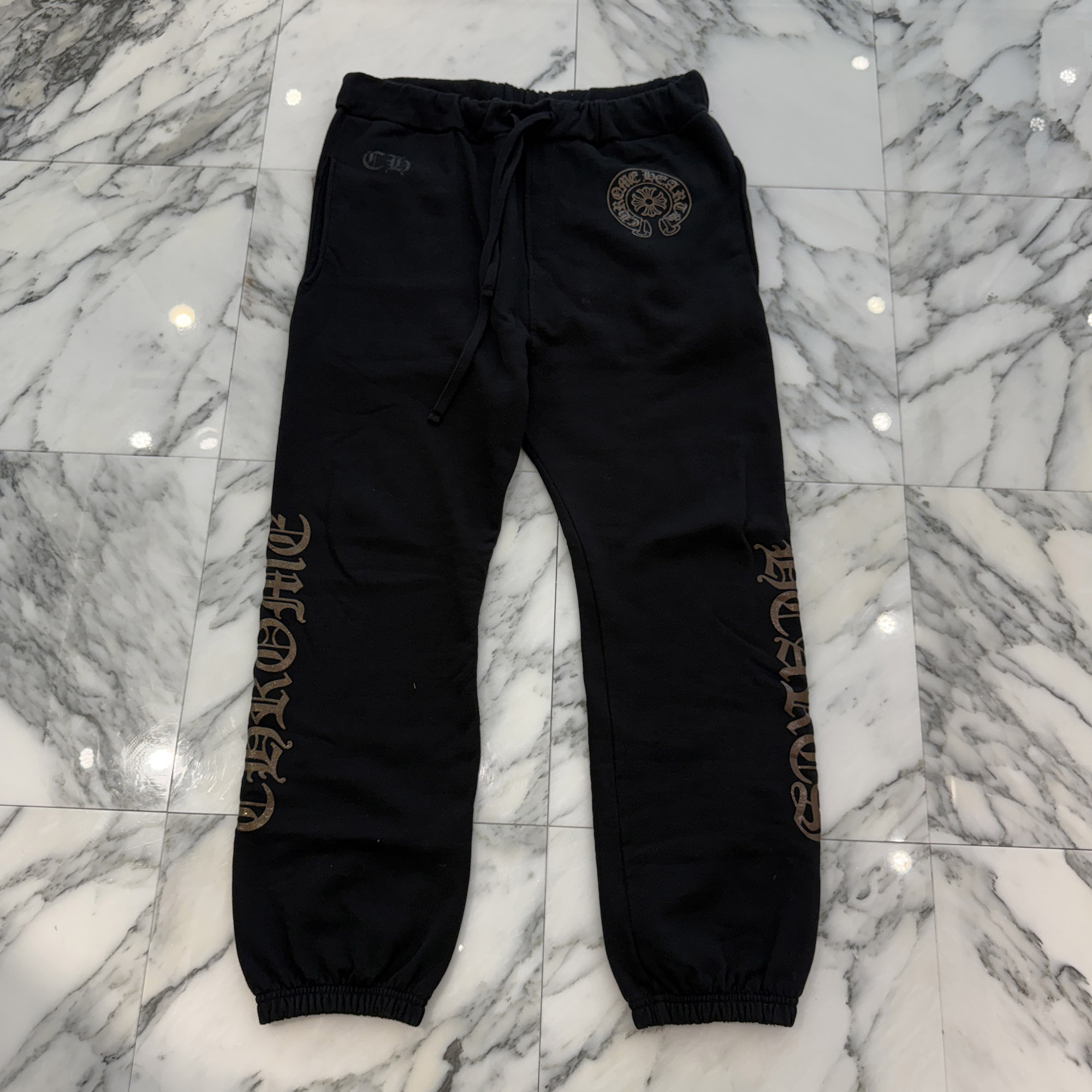 CHROME HEARTS 1998 Glitter Horseshoe Sweat Long Pants Size XL クロムハーツ 1998 グリッター ホースシュー スウェット ロングパンツ ラメ加工 サイドロゴ CHロゴ オンライン限定 ブラック&times;ブラウン サイズXL【260712】【中古-A】｜メメントスオンライン店