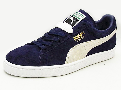 navy blue and white puma suede