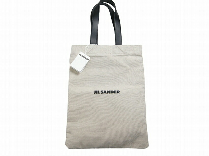 【JIL SANDER/ジルサンダー/ JSPT852457 WTB73003N FLAT SHOPPER GRANDE/フラットショッパー バッグ/キャンバストートバッグ ロゴ/TOTE BAG/持ち手 レザー製/レディースですがメンズも着用可/102/アイボリー】【イタリア製】