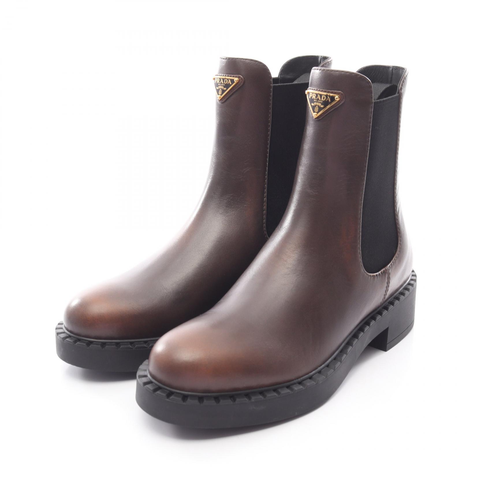 【15%OFFクーポン対象】プラダ PRADA チェルシー ブーツ 靴 レザー レディース ブラウン系 【中古】 103,400円