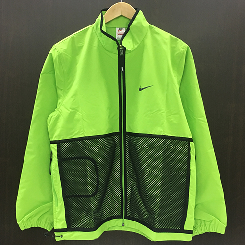green nike running jacket
