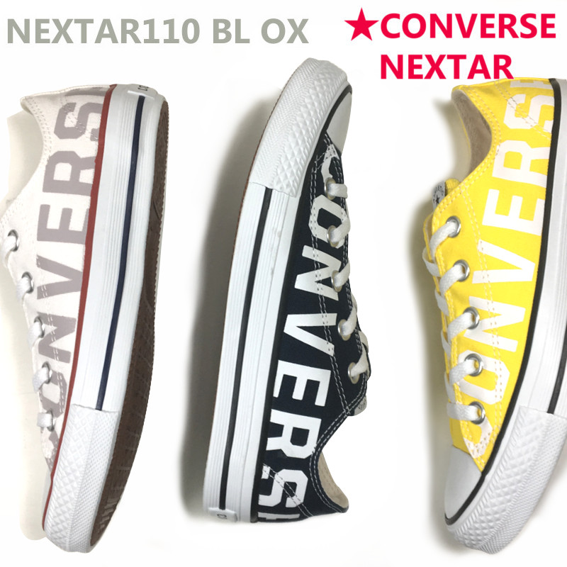 navy and yellow converse