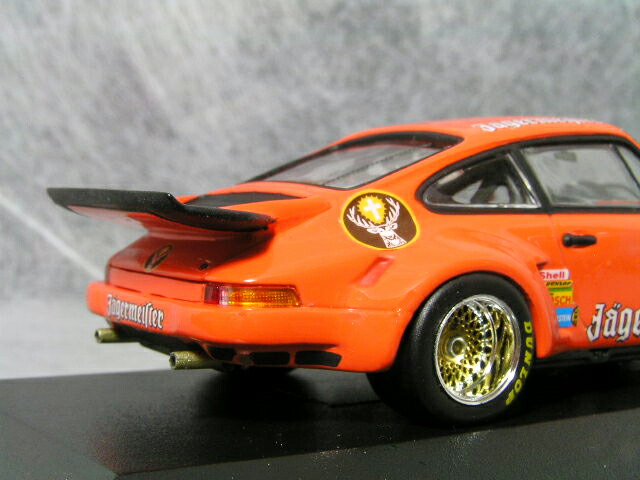 ミニチャンプス1/43ポルシェ911(930)カレラRSR/ニュルブルックリンクGTレースイエガーマイスター#4