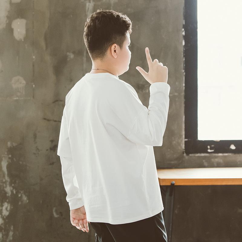 ティーシャツ ボーイズ お坊っちゃん ゆったり 馬鹿でかい大いさ ビッグ影ぼうし ぽっ自転車 長袖 ロング衣袂 うつり変わり袖 目論む 綿 綿織物 労働者の一団のど首 心地好い スポーティ 普段着 白 黒(x3)