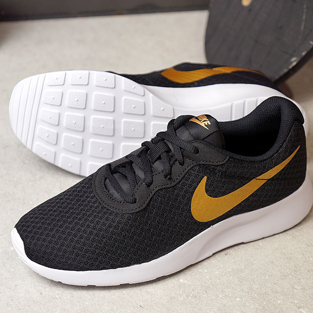 nike tanjun schwarz gold