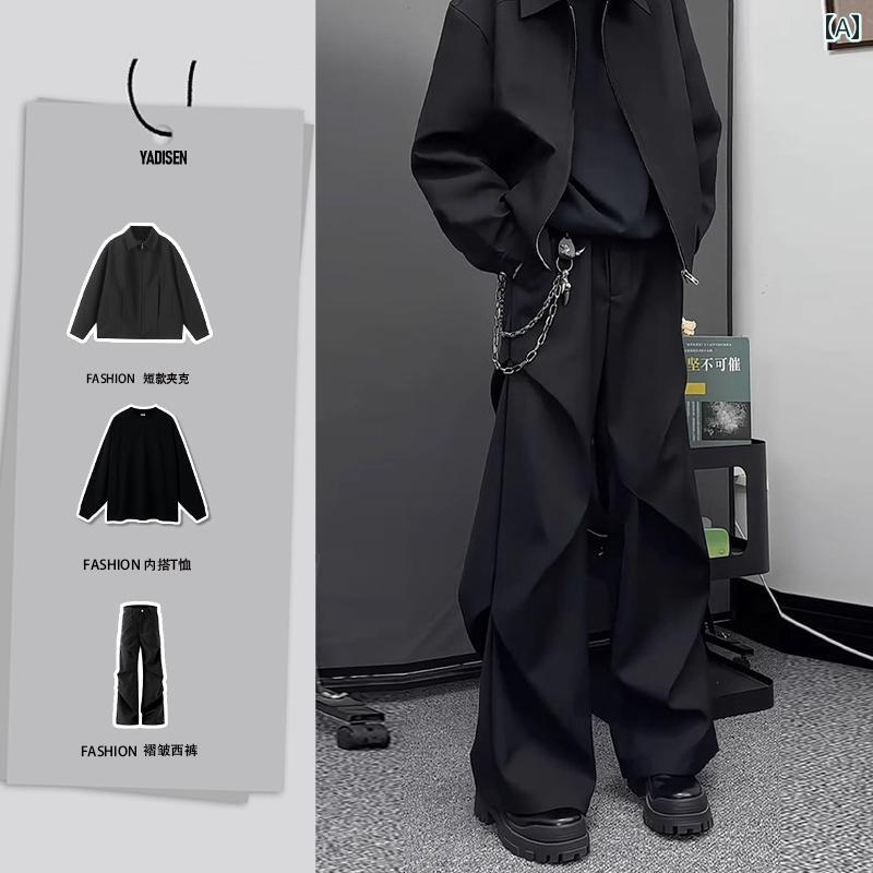 レディース　スカート　カジュアル ドレープ 感の ある 黒の シミター フレアパンツ。 黒い 服を 着た 少年が ハイエンド プリーツ入りの 空挺 部隊用 ワイド レッグ オーバー オールを 着ている