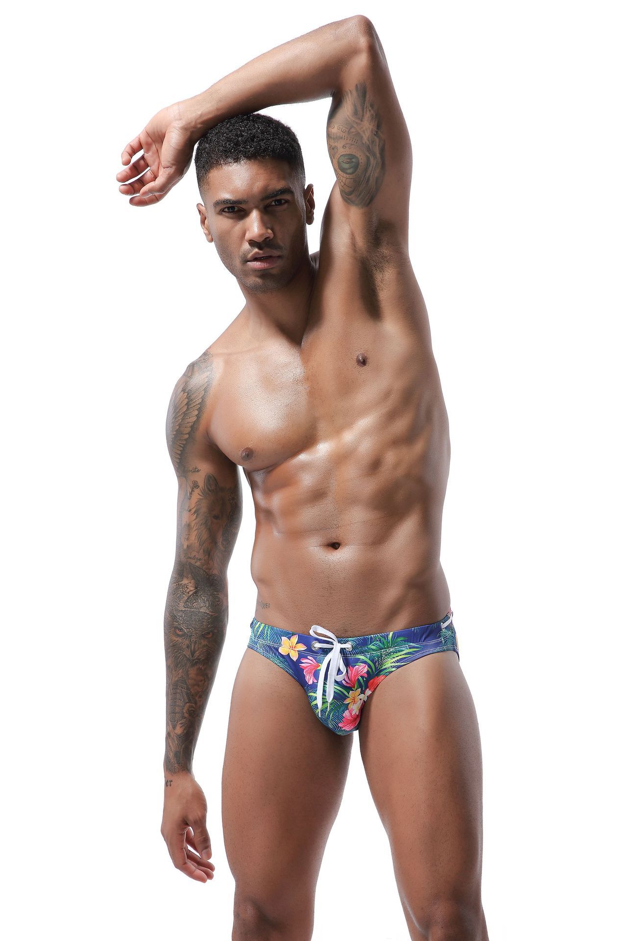 Men's swimsuit bikini shaped front three-dimensional resort swimsuit male swimsuit panty floral pattern leopard men's swimwear boomerang pants