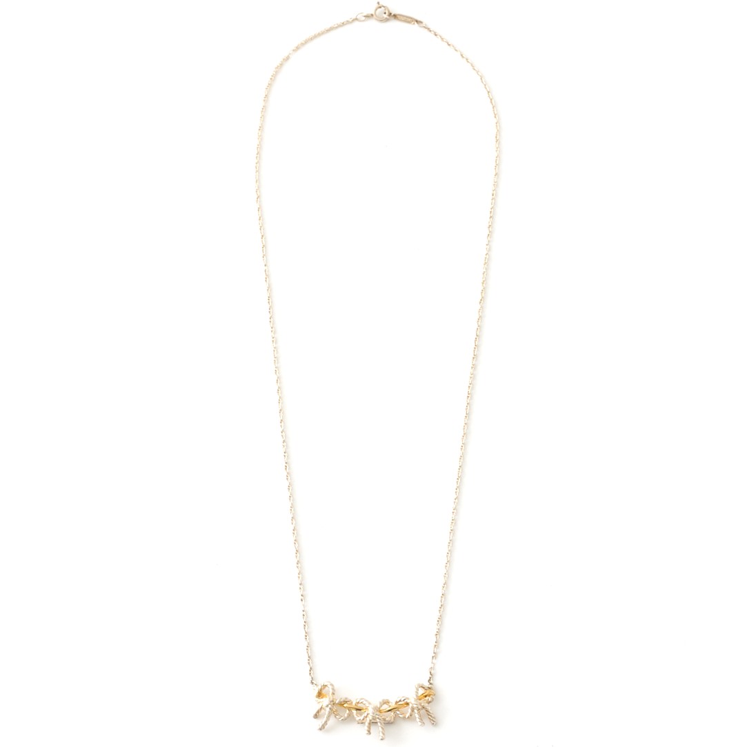 Tiffany&Co.　トリプルリボン　K18　ゴールド　sv925 Tiffany&Co. トリプルリボン K18 ゴールド sv925 - メルカリ