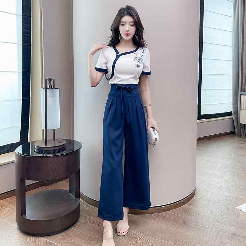ユニフォーム レディース 吸汗速乾 スリムフィット 上品 エステ サロン スパ マッサージ 美容師 作業着 制服 半袖 長ズボン 上下セット オールシーズン ポリエステル ストレッチ素材 紺 ネイビー｜モズラボ