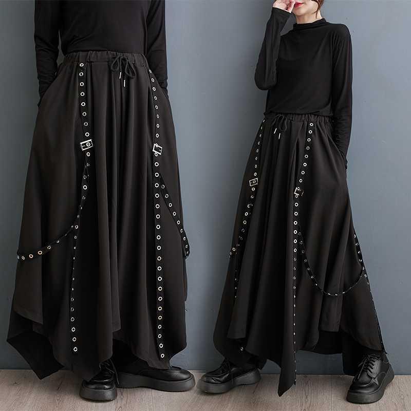 スカートパンツ レディース 春夏 アシンメトリー 変形デザイン スタッズ ウェビングテープ装飾 ゆったり ワイドシルエット ロング丈 ウエストゴム ブラック アクリル素材 フリーサイズ きれいめ 通勤 オフィス