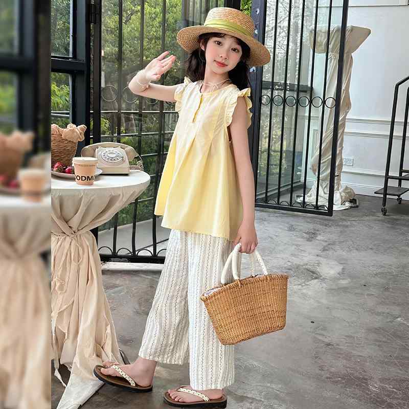 キッズ 女の子 ジュニア 夏服 韓国風 おしゃれ セットアップ ノースリーブ フリル袖 チュニックブラウス ストライプパンツ 上下セット 薄手 柔らか綿素材 通学 普段着 4,538円