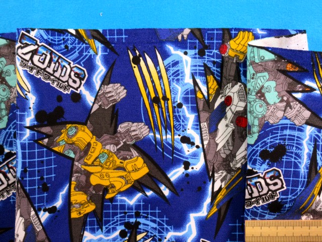 綿プリントオックス生地ゾイドワイルド紺×イエロー（110cm幅　1m）画像