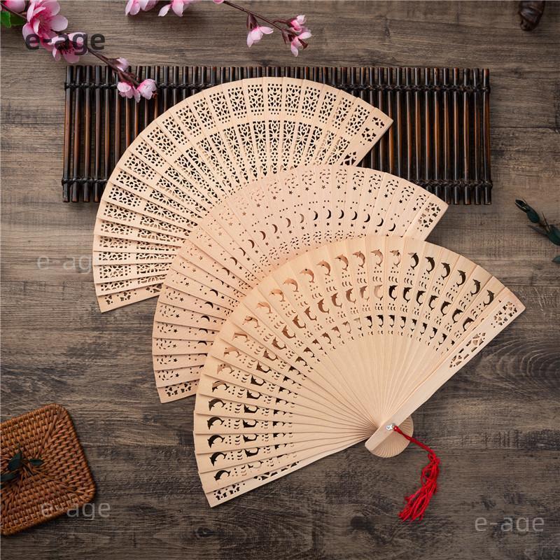 檀香扇子　透かし彫り 木製扇子 彫刻　和装小物 楽天市場】木製透かし彫り扇子(香り付き) : 天宝堂