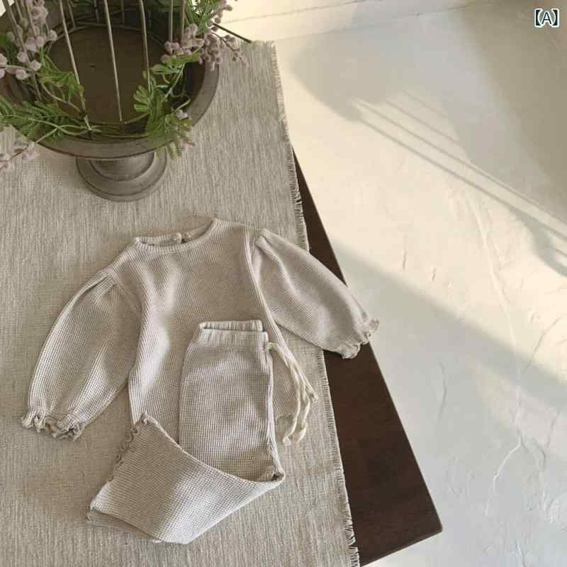 キッズ セットアップ 女の子 秋 ワッフル生地 長袖 プルオーバー トップス 波型フリル フレアパンツ 柔らか加工 綿 ポリエステル 無地 韓国風 カジュアル 普段着 1歳 2歳 3歳 80 90 100cm アプリコット ブラック