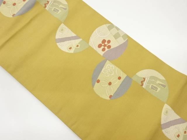 丸紋に花・抽象模様織出し名古屋帯【中古】【着】