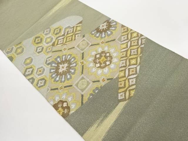 綴れ亀甲に七宝・花々模様織出し名古屋帯【中古】【着】【名古屋帯】