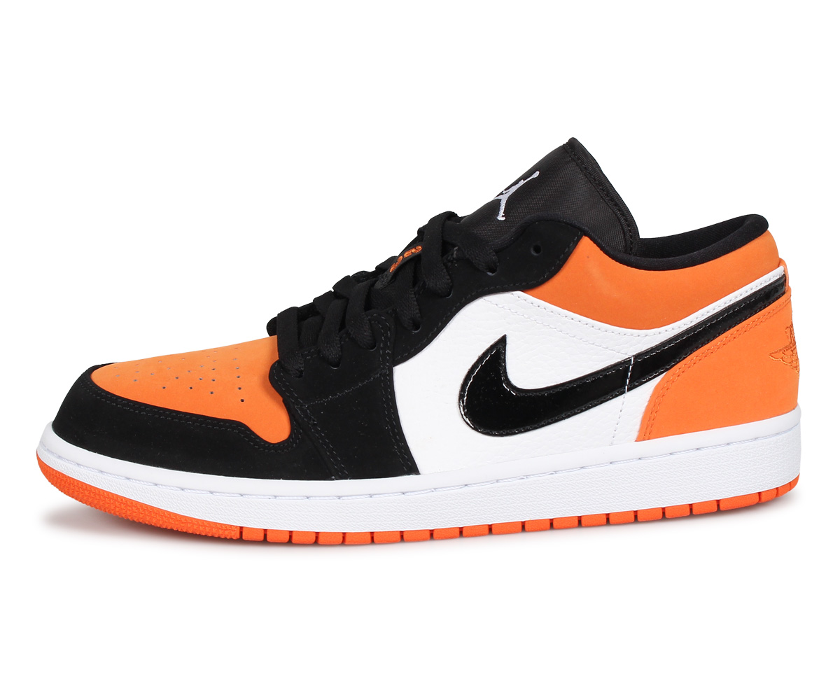 Низкие кроссовки найк. Nike Air Jordan 1 Low Orange. Nike Air Jordan 1 Low Orange Black. Nike Air Jordan 1 Orange Black.