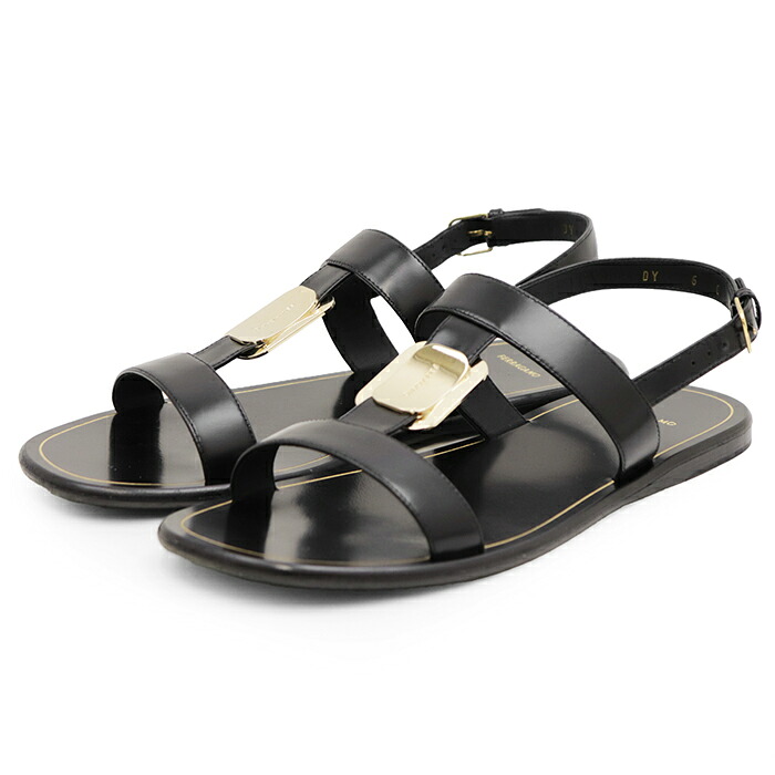 SALE【美品】Salvatore Ferragamo サルヴァトーレフェラガモ フラットサンダル サイズ 42 レディース レザー ロゴ メタルチャーム ストラップ レザーソール シューズ 革靴 袋付属 ブラック ゴールド 黒 金色 イタリア製【中古】