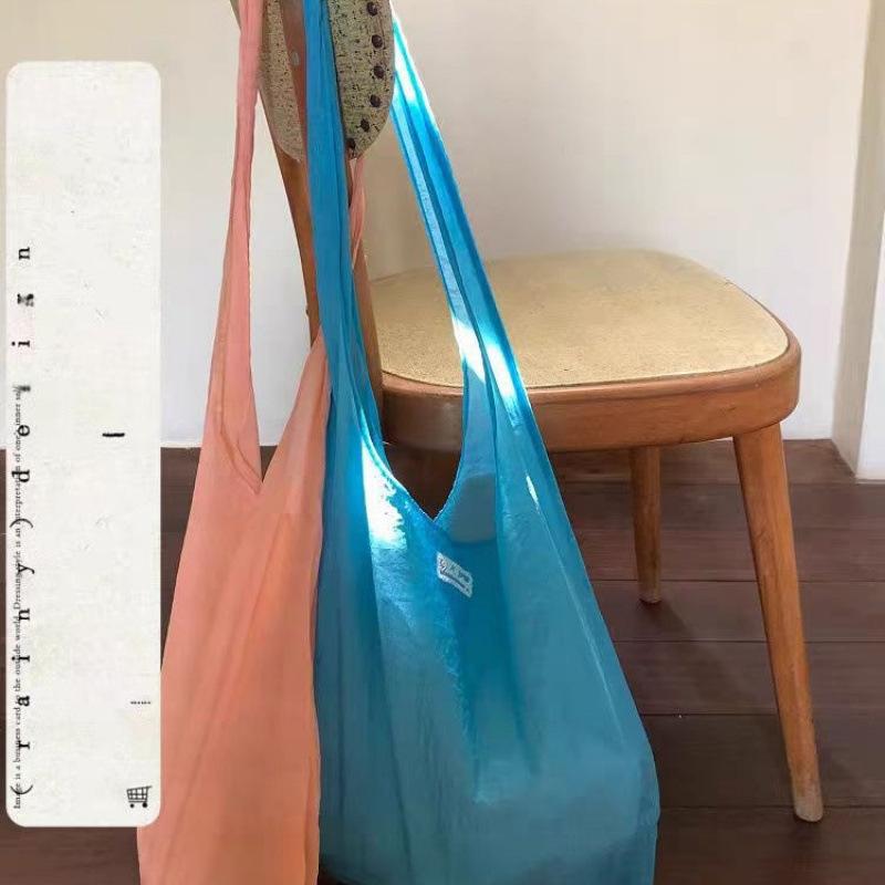 御徒面子 レディース マカロンカラー パステルカラー 春夏 口さかしい 好いたらしいめ 都市分かりやすい 布トートバッグ 手提げ 肩かけ 2way 大静電容量 日常使い走り 普段使い走り ポリエステル 横型 真四角 青み サクラ色系