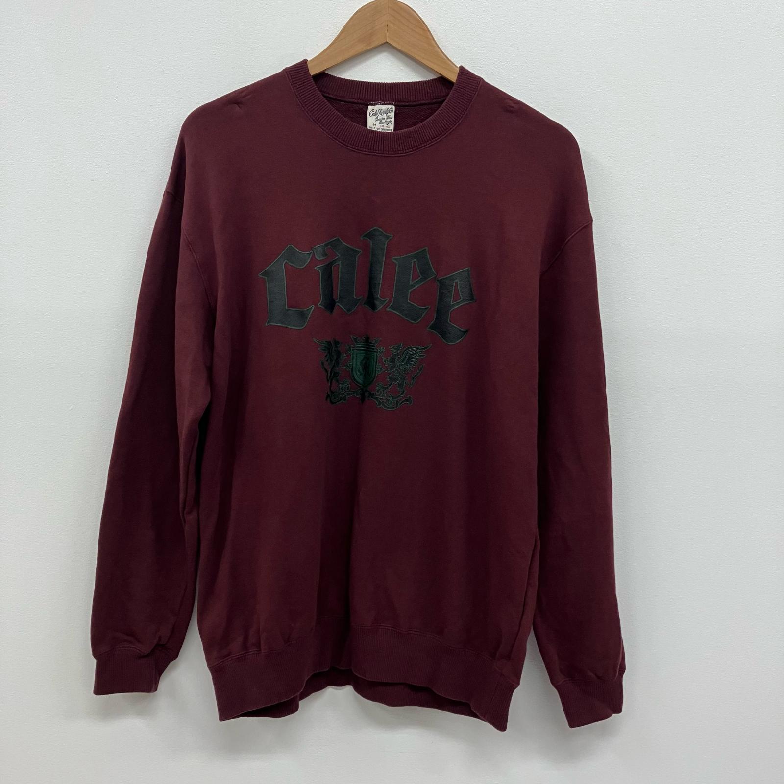 【中古】CALEE | 持ちはこび EMBLEM LOGO CRE NECK SW 流汗 CL-25AW014 ボルドーワイン/バーガンディー 大きさ：M【イオン広店】