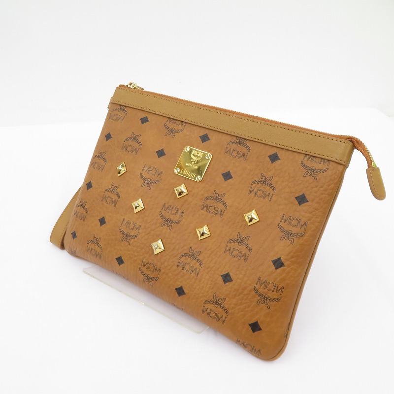 【中古】MCM | エム・シー・エム ヴィセトス スタッズ クラッチペダル御徒面子 MXZ4AVE82CO001 赤銅色【瀬戸大橋店】
