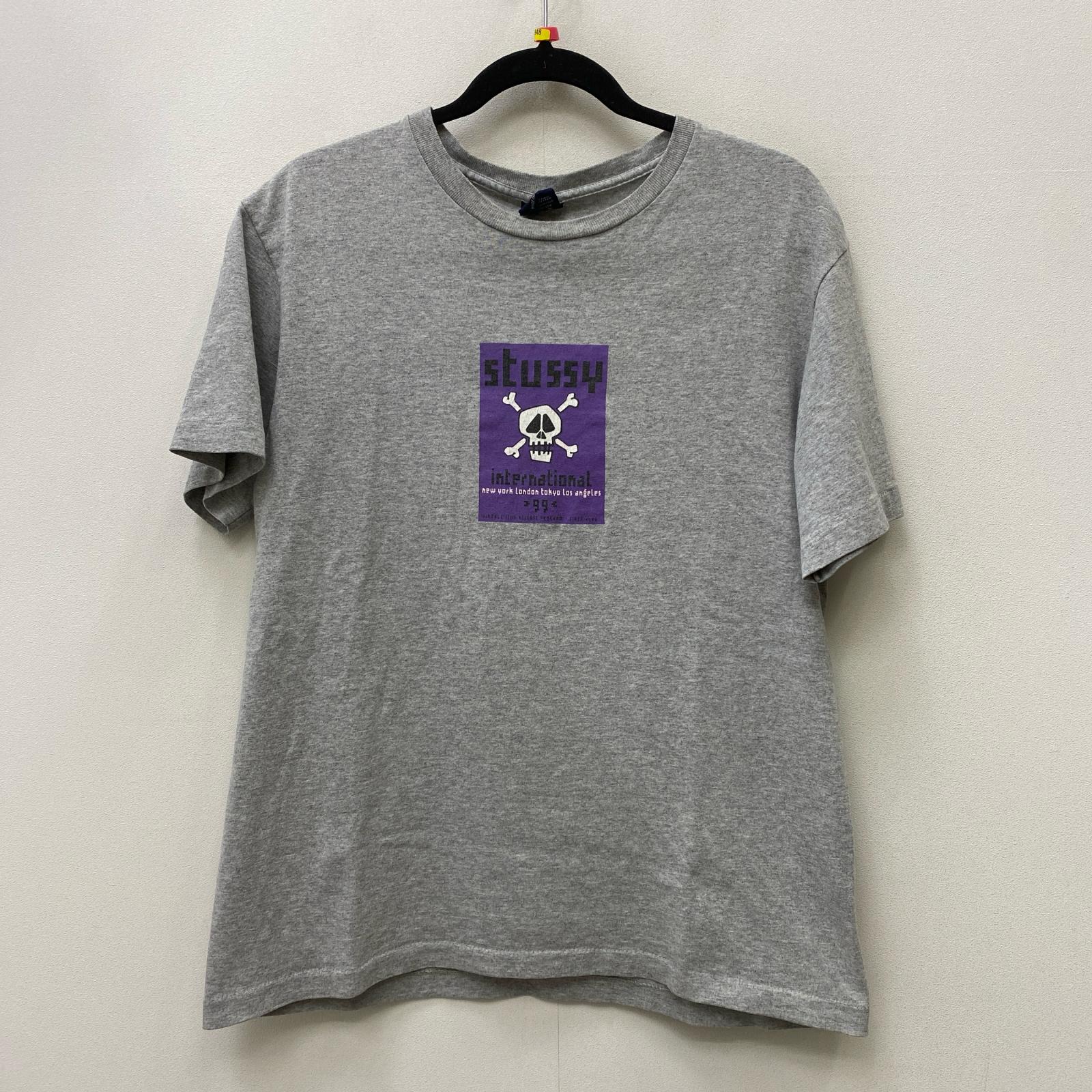 【中古】STUSSY | ステューシー SKULL INTERNATIONAL T  USA製 半袖Ｔシャツ 薄墨色 大きさ：M【加古川店】