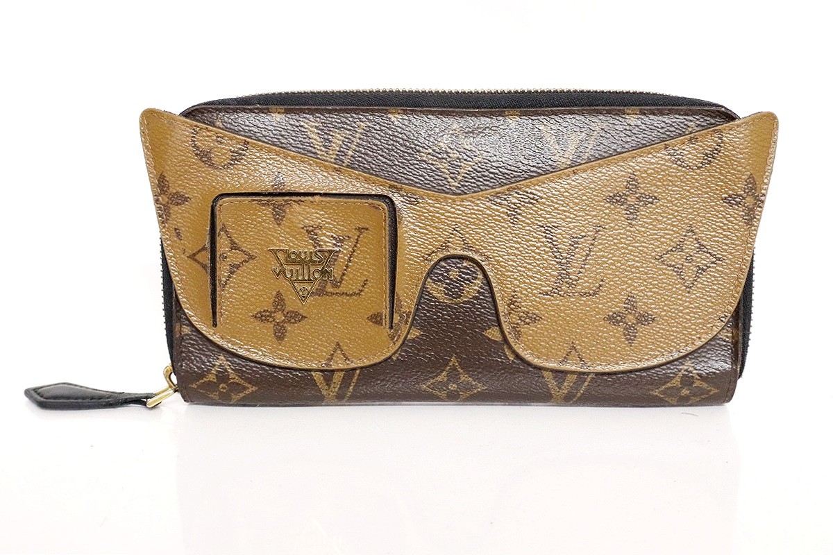 【中古】【ストラップ欠品】LOUIS VUITTON モノグラム・リバース ジッピー・ウォレット シャディ M68796 \
