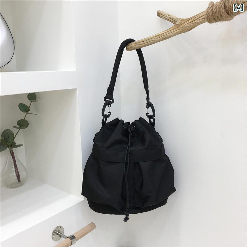 レディース バッグ 普段使い 通勤 小さめ ファッション大容量 カジュアル 巾着 防水 ナイロン 布 バケツ ポータブル ショルダー クロス ボディ スポーツ 4,365円