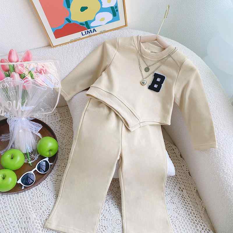 子供服 女の子 キッズ 女児 セットアップ 上下セット 綿 コットン アシンメトリー 変形 トレーナー スウェット 長袖 ワイドパンツ ガウチョパンツ ロングパンツ 無地 柔らかい ソフト カジュアル 韓国ファッション 秋冬 アプリコット ベージュ系
