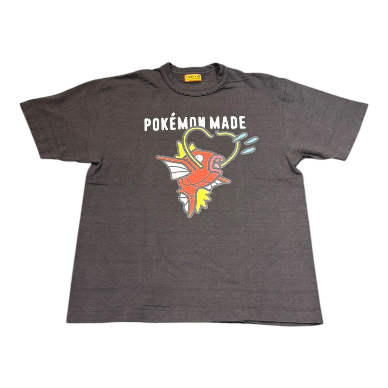 HUMAN MADE x Pokemon Made Graphic T-Shirt #3 (Koiking) \"Black\""ヒューマンお手伝いさん x ポケモンメイド グラフィックプルオーバー #3 (コイ第一人者) \""黒いこと\""2026SS 置き目品 新古品【中古】"
