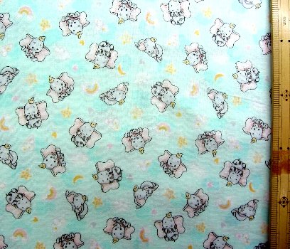 生地 ダブルガーゼ キャラクター ダンボ ( グリーン みどり ) 柄番号8（ 布 綿100％ ) 生地幅－約106cm （ 商品の特性上、柄が多少歪んでいる場合がありますのでご了承ください。 ) （ ディズニー マスク )画像