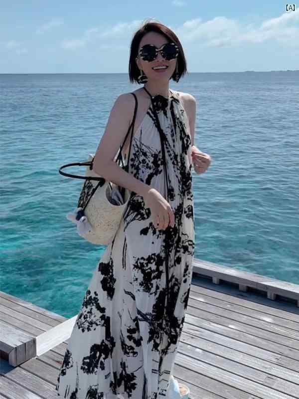 レディース　ファッション　コーデ　春　夏　秋 レディース ブラック ホルターネック ドレス ハイエンド 海辺 休暇 クール ユニーク シック フレンチ プリント スカート 夏 7,482円