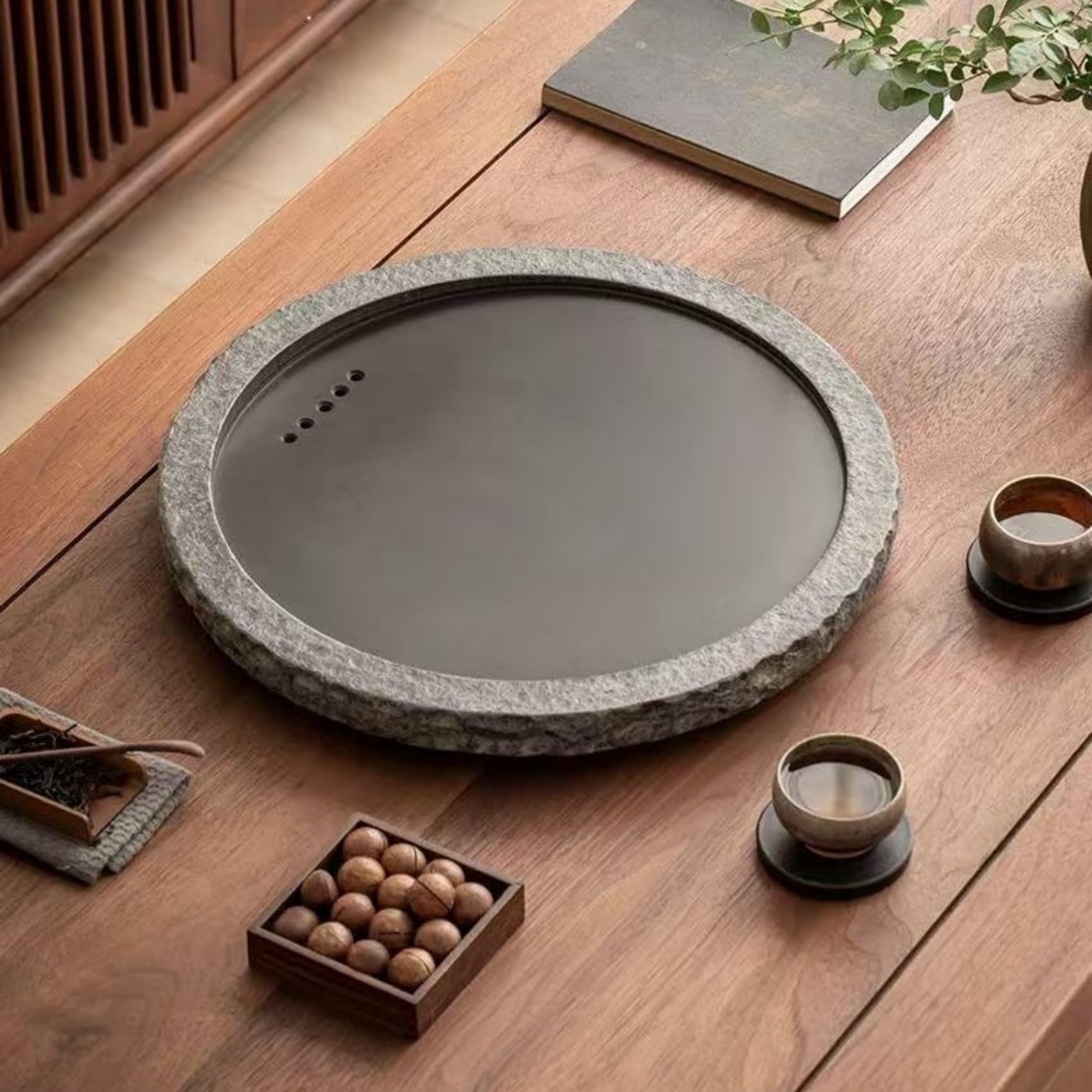紅茶お盆 丸い・円い石の茶海 分かりやすいな紅茶お盆 烏金石で作られた 天然石 孔状水抜き心積もり 手作業みがき上げる 茶渋が付きにくく 取りつくろうが飾り気の無い 耐久性に優れ ご身寄りでの当て嵌めるに至適で