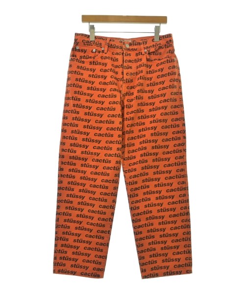 STUSSY ステューシーデニムパンツ メンズ 30(M位) オレンジ色x黒(総柄)【中古】【古着】