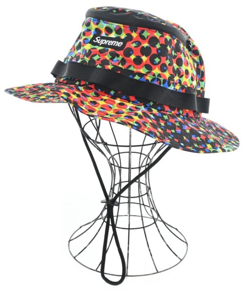 Supreme シュプリーム ハット メンズ - 赤x黒x黄等(総柄) 【中古】【古着】