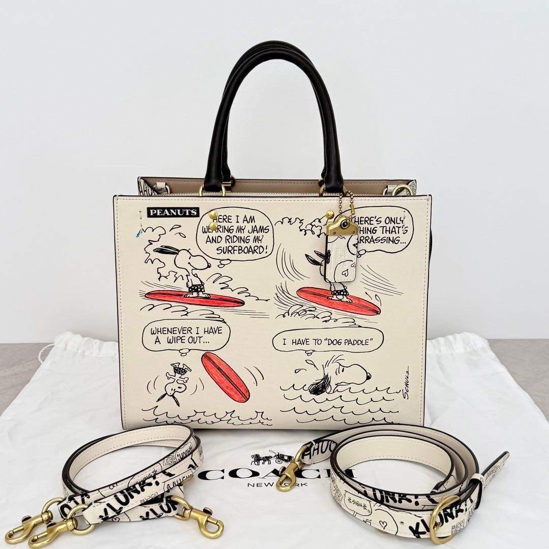 【中古】COACH コーチ × PEANUTS ローグ バッグ ニュースペーパー プリント|Reuse Select by Rakuma