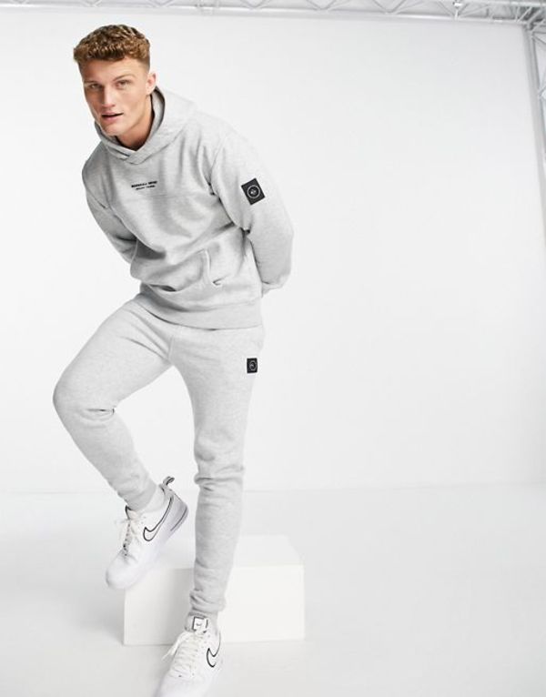 マーシャルアーティスト メンズ カジュアルパンツ ボトムス Marshall Artist siren tapered sweatpants in gray heather GRAY