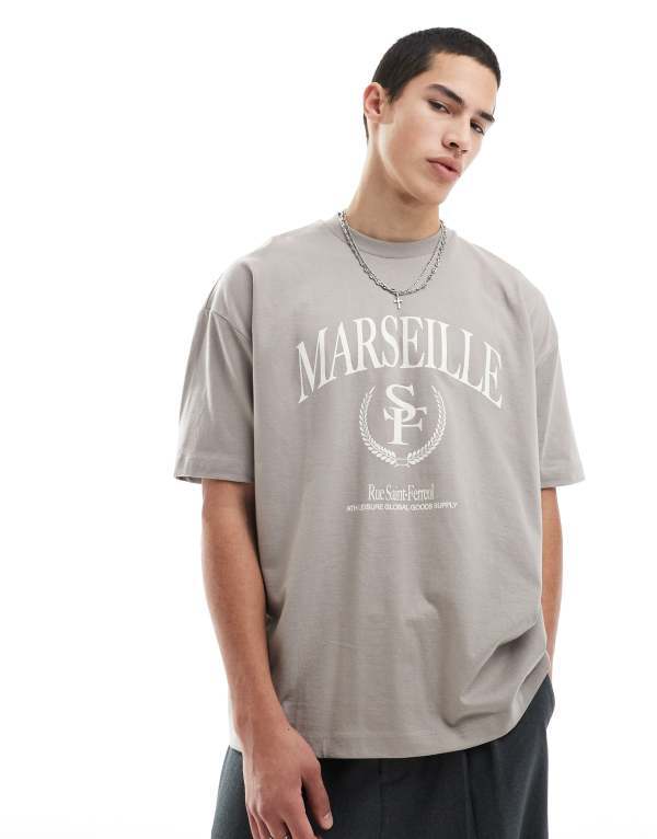 エイソス メンズ トップス Tシャツ グラフィック ASOS DESIGN oversized t-shirt with varsity graphics Driftwood ブラウン